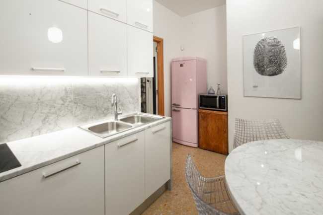 Renovated apartment in the center of Cuneo. New perception of space through the design of the furniture