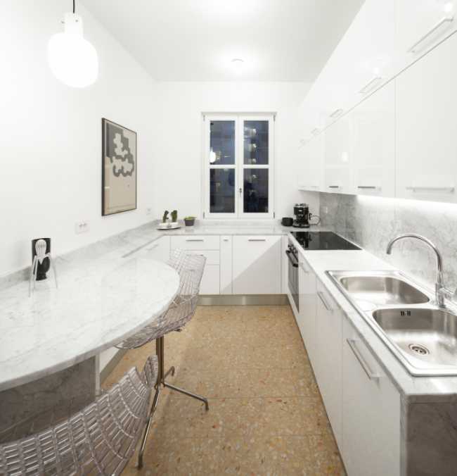 Renovated apartment in the center of Cuneo. New perception of space through the design of the furniture