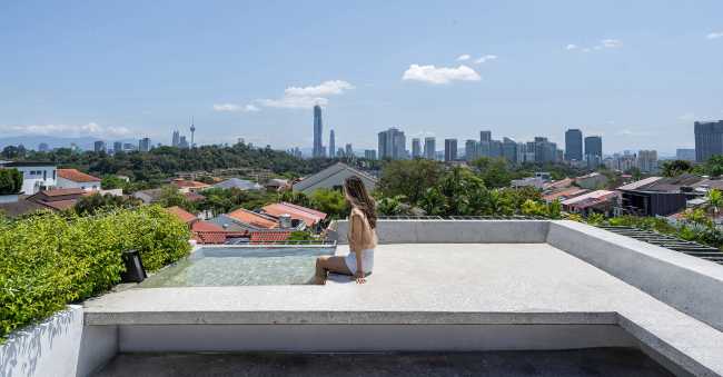 House on the hills in Malaysia. Panoramic view of the city's imposing skyline.