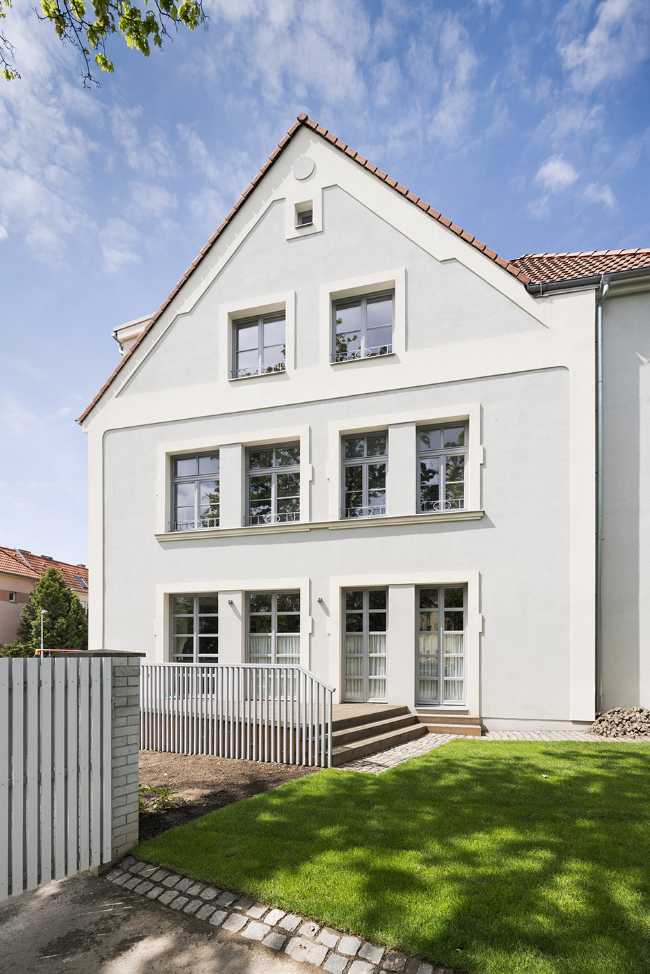 Villa storica a Praga. Ricostruzione per il co-living di tre famiglie