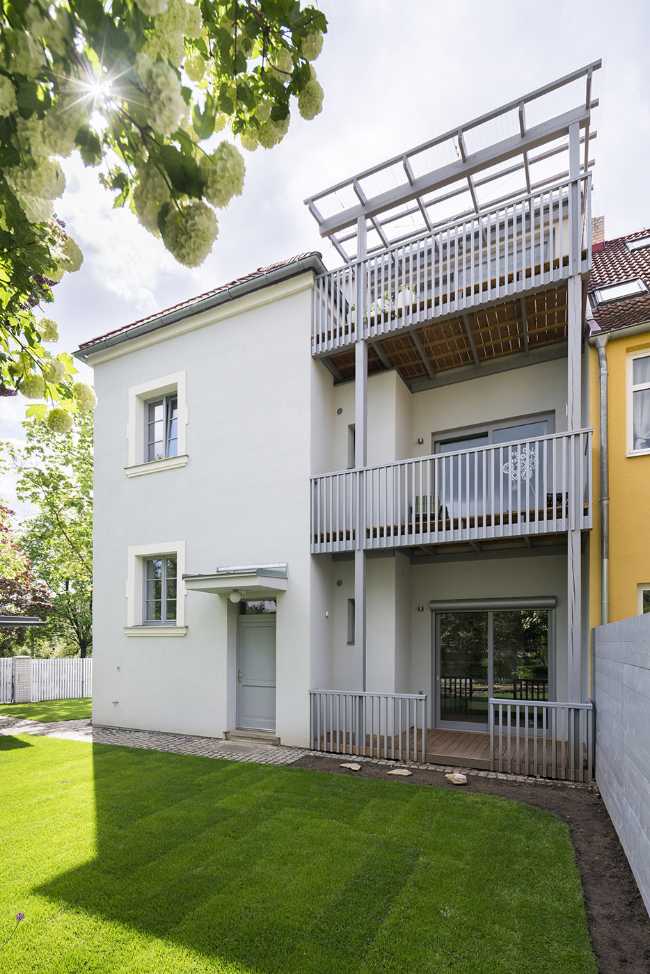 Villa storica a Praga. Ricostruzione per il co-living di tre famiglie