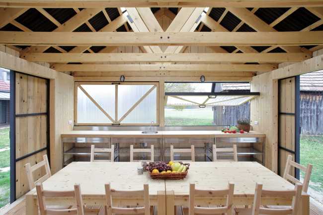 Farm surrounded by the picturesque Bohemian nature. New wooden farm building