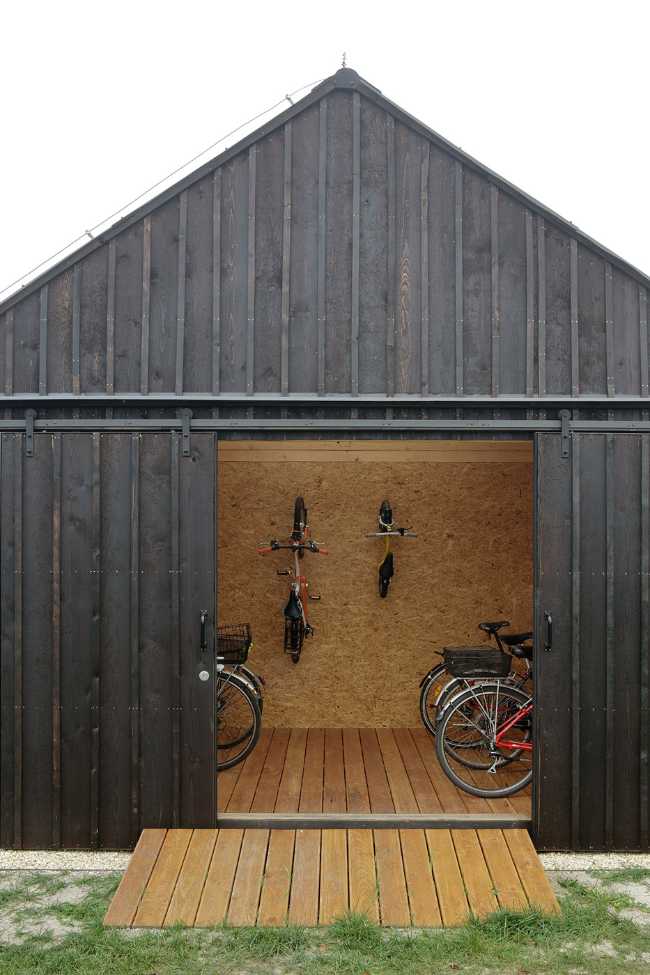 Farm surrounded by the picturesque Bohemian nature. New wooden farm building