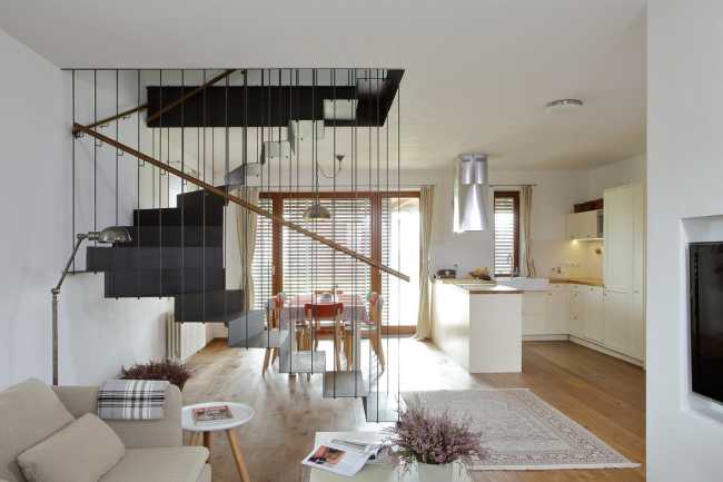 Farm surrounded by the picturesque Bohemian nature. New wooden farm building