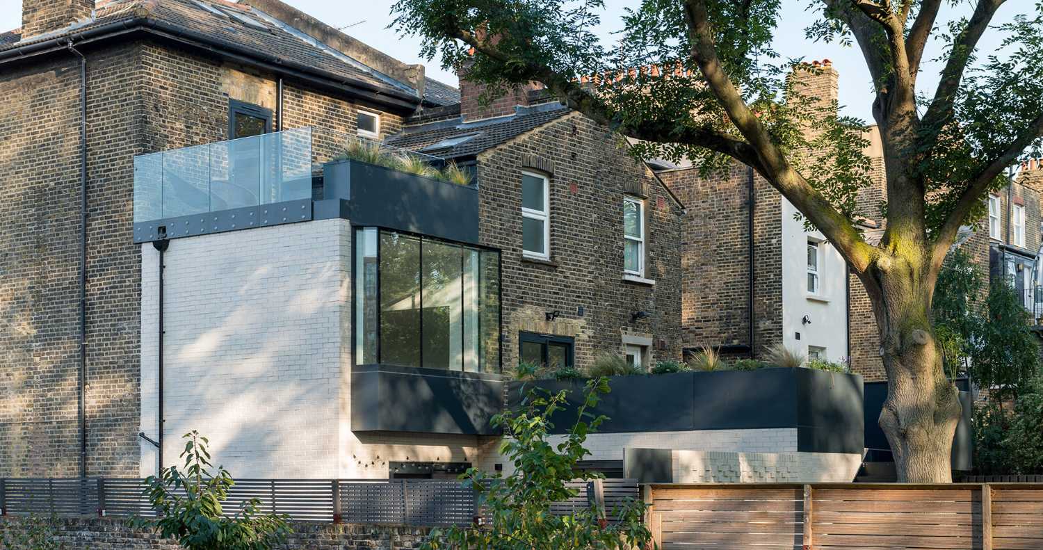 Revisiting a Victorian home. Materials and colors combine to offer new opportunities for light and space