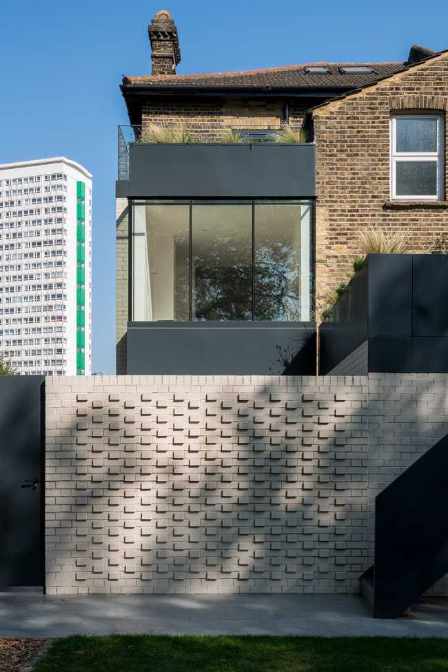 Revisiting a Victorian home. Materials and colors combine to offer new opportunities for light and space