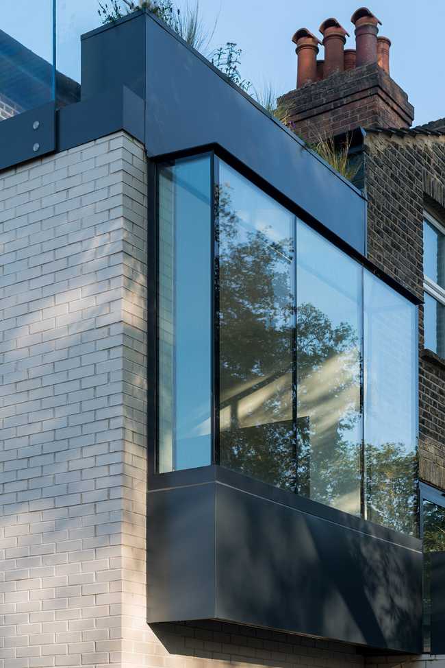 Revisiting a Victorian home. Materials and colors combine to offer new opportunities for light and space