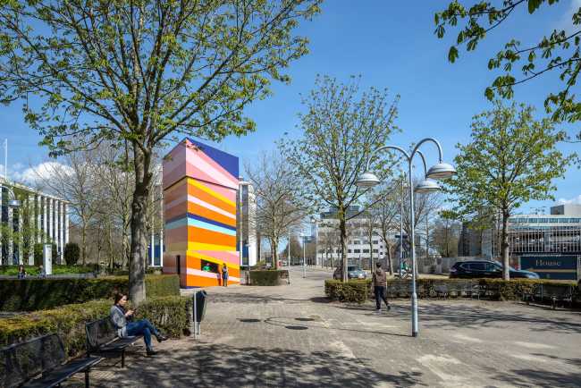 Folly KomEtenPlein. Lively triangular pavilion for outdoor meetings