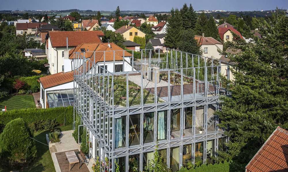 Steel corset wraps around a dwelling. Reinforcing a 1930s building