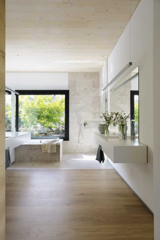 Progetto CH, a private residence intertwined with cosy interiors and verdant outdoor spaces