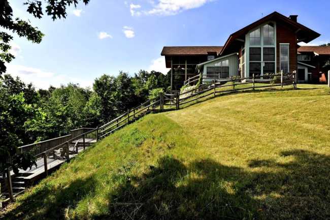 Lazy Bear Pool House: a huge wooden pool house for a tropical getaway...at home