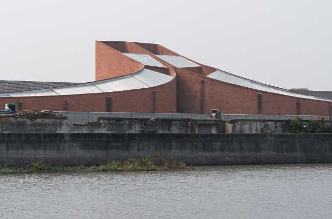 Discovering the soul hidden in an old building and bringing it back to light: TaoCang Art Center