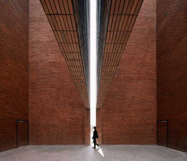 Discovering the soul hidden in an old building and bringing it back to light: TaoCang Art Center