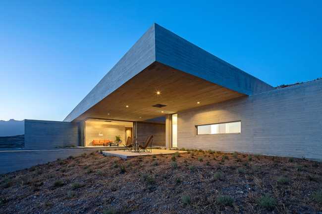 Lap Pool House: an artificial cave carved into the natural landscape of a Greek island