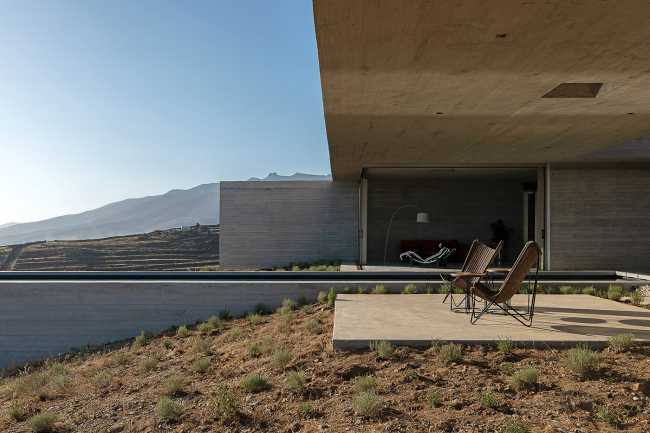 Lap Pool House: an artificial cave carved into the natural landscape of a Greek island