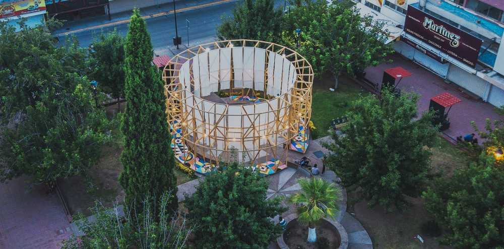 Antelia Citizien Forum. A circular wooden cylinder brings together the city's inhabitants