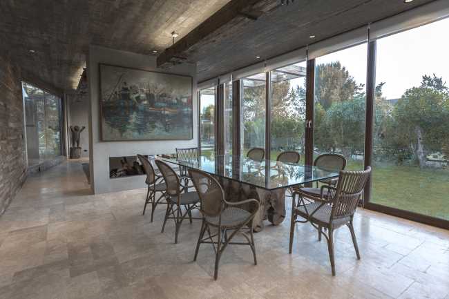 Machagua, a country house with overlapping structures overlooking the sea