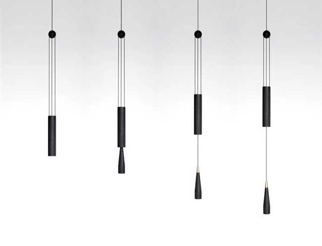 A balance between game and technology: a light in motion with the Trio wooden lamp