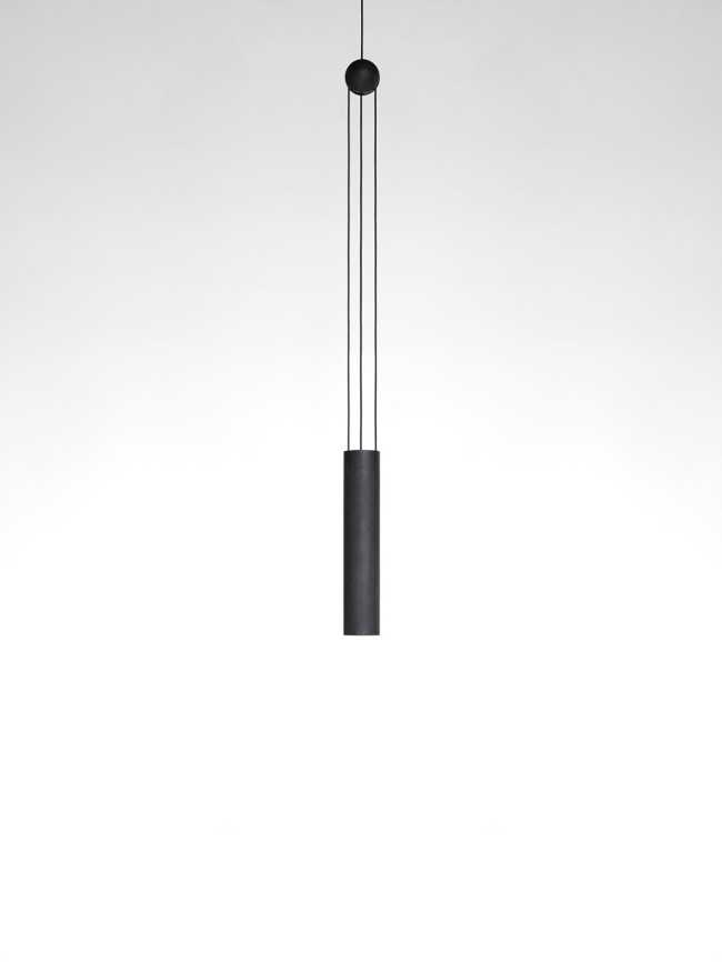 A balance between game and technology: a light in motion with the Trio wooden lamp