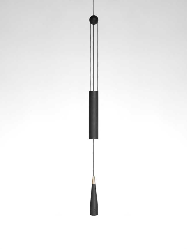 A balance between game and technology: a light in motion with the Trio wooden lamp