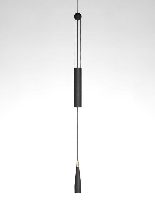 A balance between game and technology: a light in motion with the Trio wooden lamp