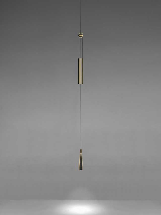 A balance between game and technology: a light in motion with the Trio wooden lamp