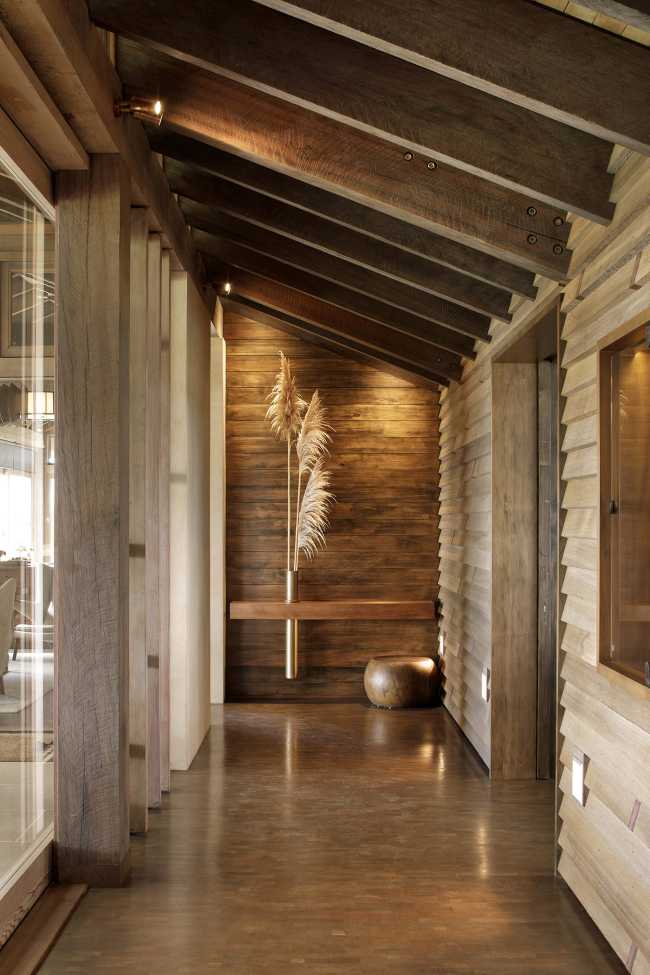 En Nueva Zelanda campos de golf, dunas de arena y el mar abrazan la delicada arquitectura de Tara Iti Clubhouse