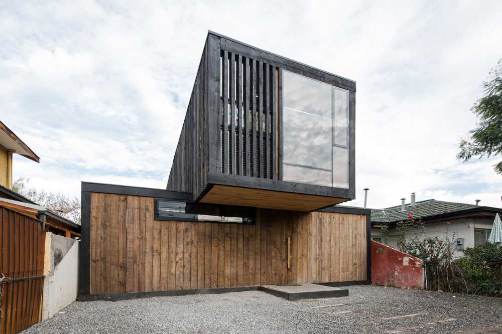 Wood, glass and concrete for FS Residence in Santiago, Chile