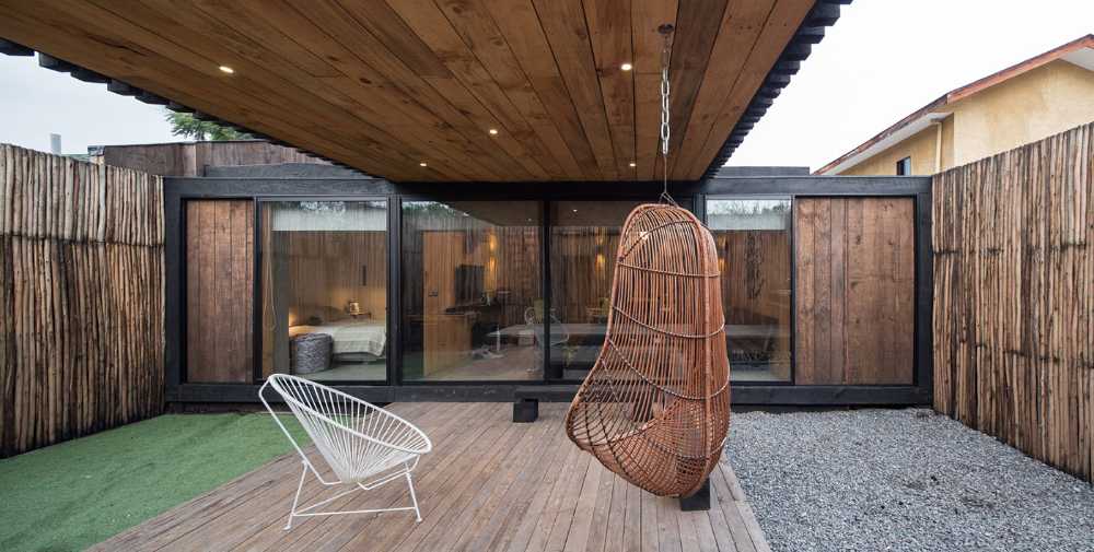 Wood, glass and concrete for FS Residence in Santiago, Chile