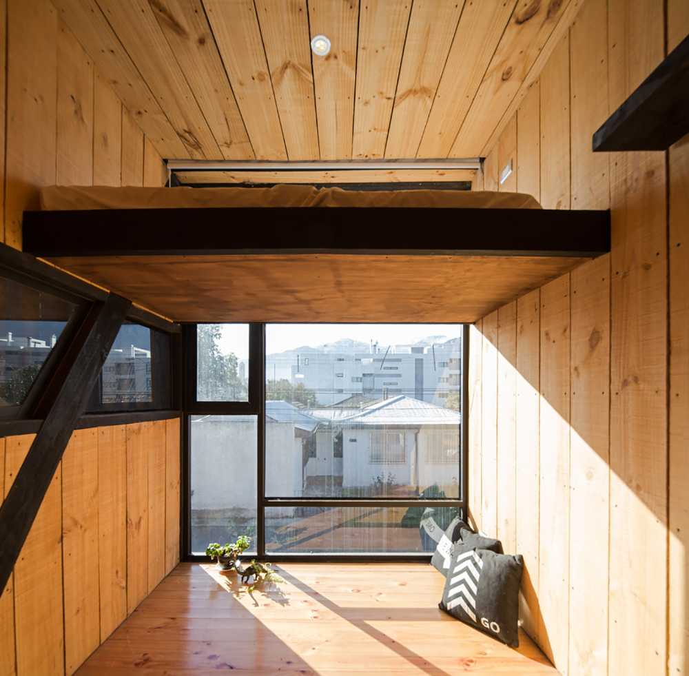 Wood, glass and concrete for FS Residence in Santiago, Chile