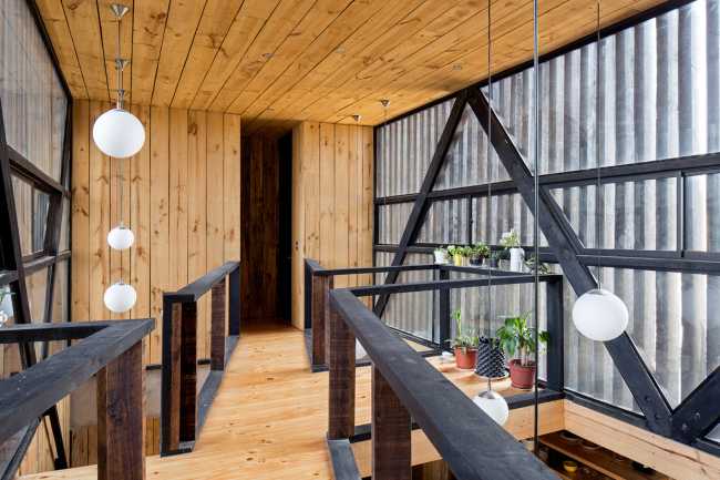 Legno, vetro e cemento per FS Residence a Santiago del Cile