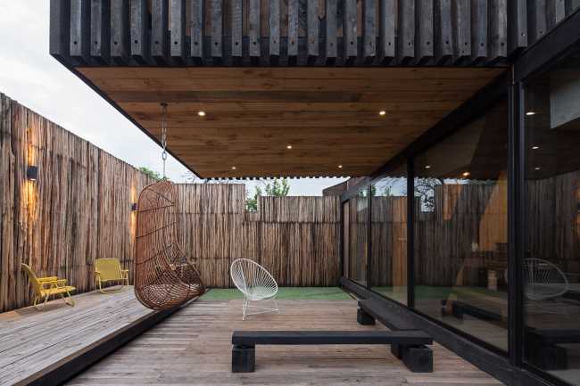 Legno, vetro e cemento per FS Residence a Santiago del Cile