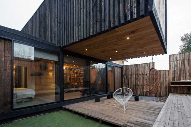 Legno, vetro e cemento per FS Residence a Santiago del Cile