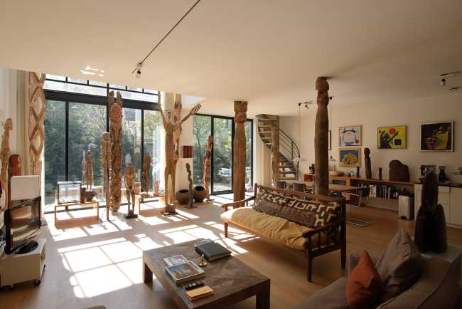 In the space of The Art Collector, architecture follows art