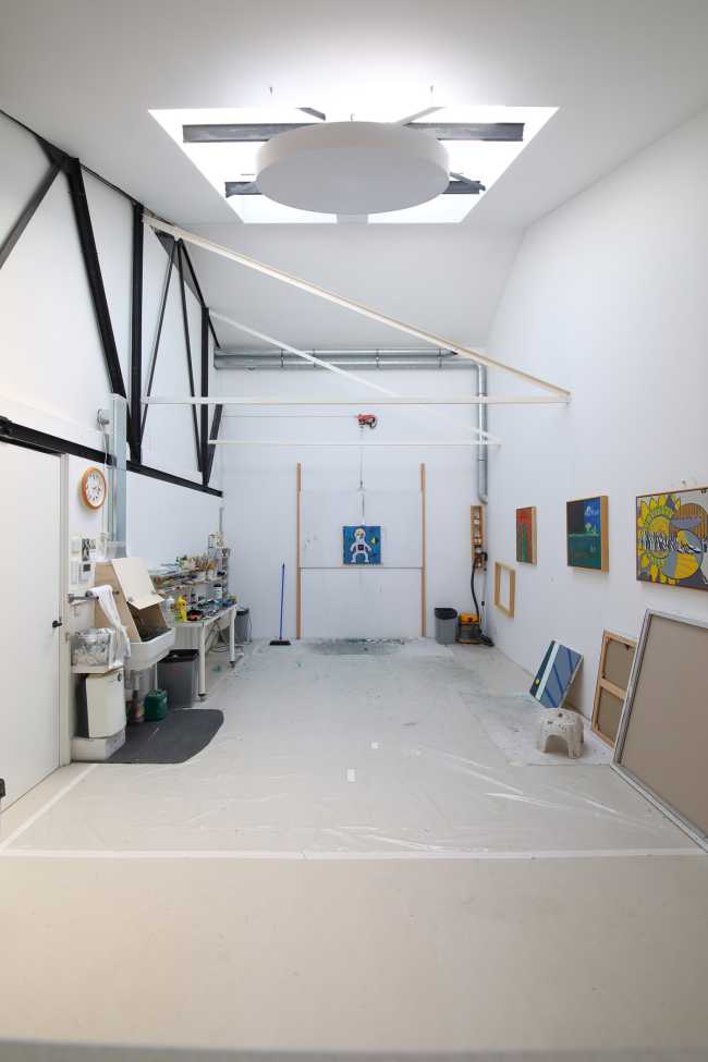 In the space of The Art Collector, architecture follows art