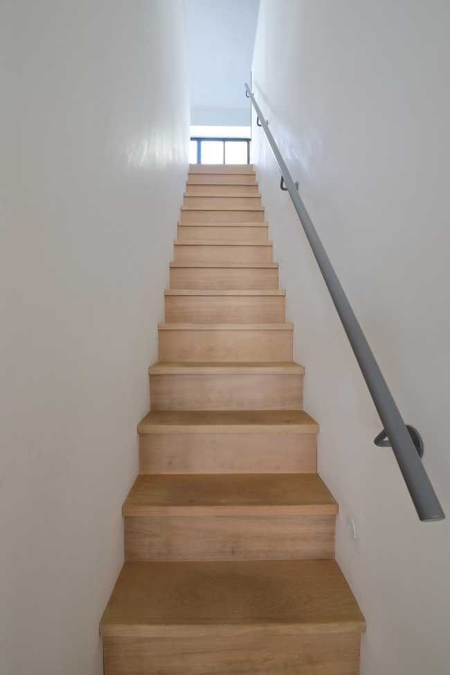 In the space of The Art Collector, architecture follows art