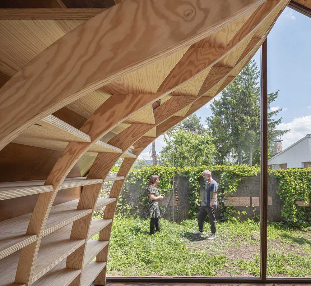 Writer's Cabin: writing children's books wrapped in sinuous wooden lines