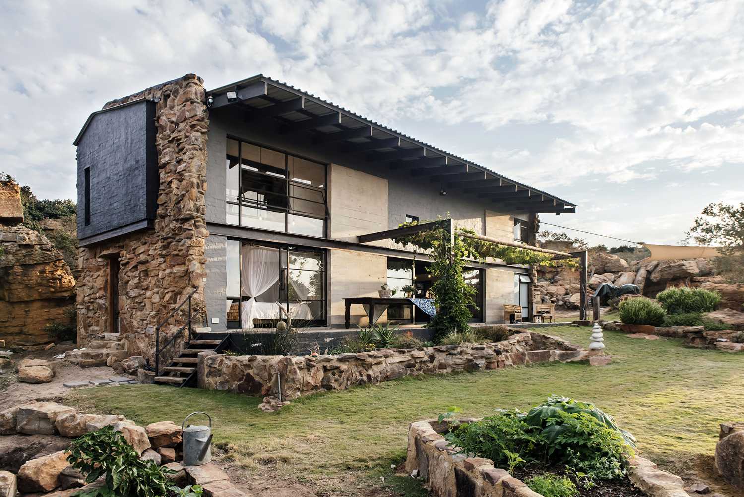 Fachada de piedra para el Cottage Rock, para escalar las paredes de su propia casa