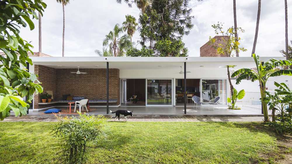 El Quincho, une extension d'une maison familiale conçue pour partager des moments ensemble à la fois à l'intérieur et à l'extérieur
