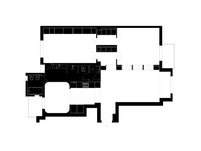 Above the treetops of Milan, in a light-filled apartment functionality and aesthetics vie for the throne