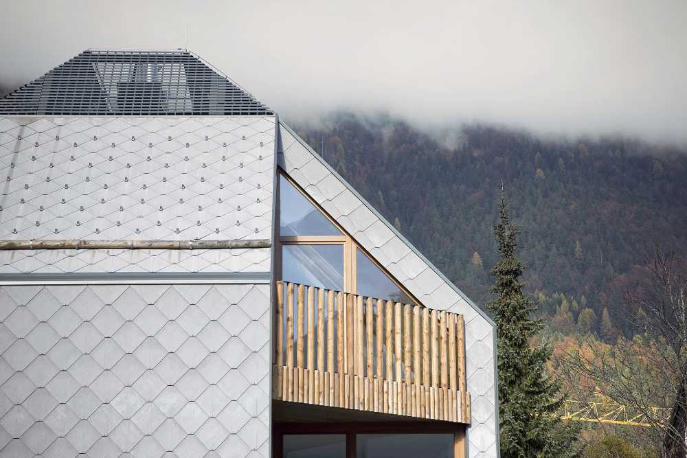 Alpine Sky Apartments, a blend of wood and metal for the high-altitude tourist complex.