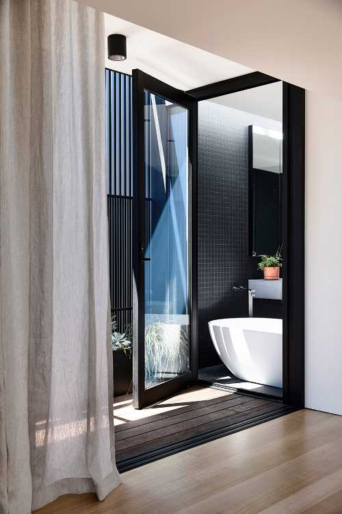 Pure materiality and clean aesthetics for a sculptural home that never forgets to