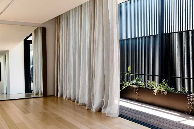 Pure materiality and clean aesthetics for a sculptural home that never forgets to