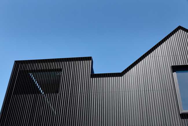 Pure materiality and clean aesthetics for a sculptural home that never forgets to