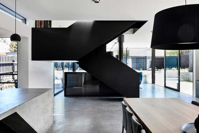 Pure materiality and clean aesthetics for a sculptural home that never forgets to