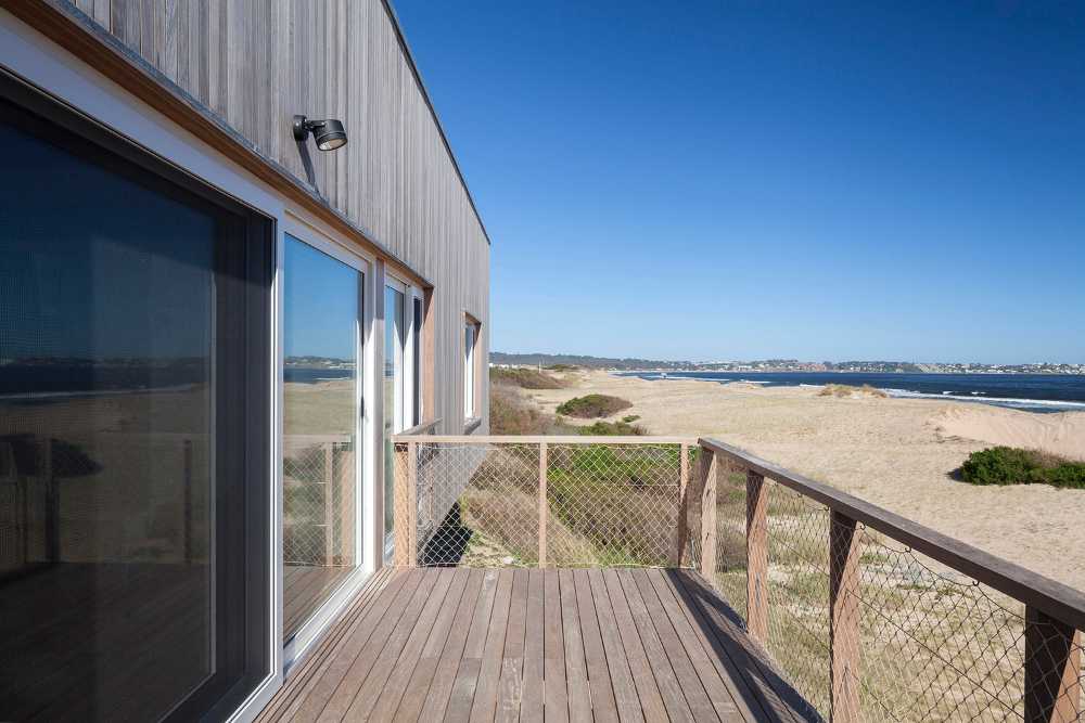 On the beach in Chihuahua, in the forefront, facing the ocean: the Beach House