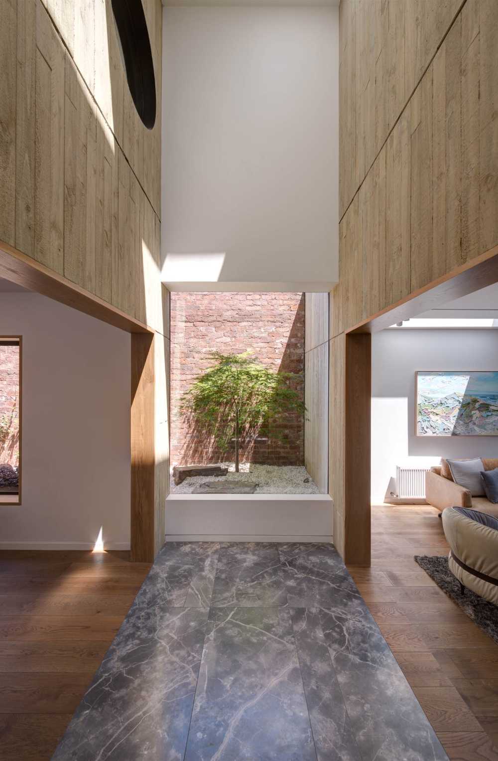 A choreography of structures narrates the Stepping Stone House