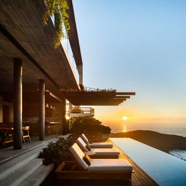 Situated on one of the highest hills in Zihuatanejo, Casa Z opens out into the landscape while soaring in the air