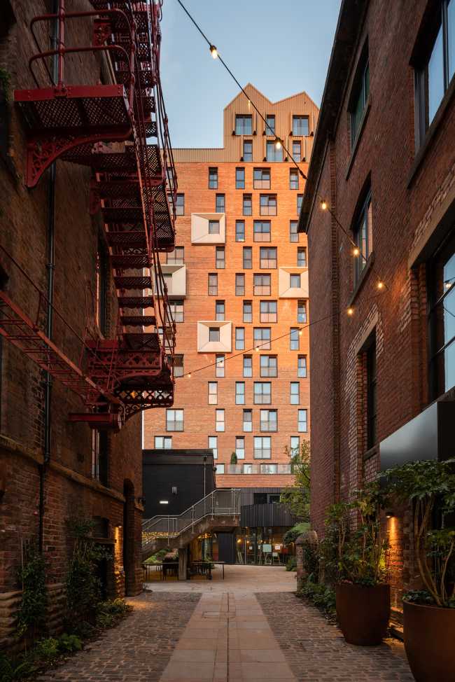 Briques rouges et jeu d'ouvertures pour le nouveau quartier KAMPUS