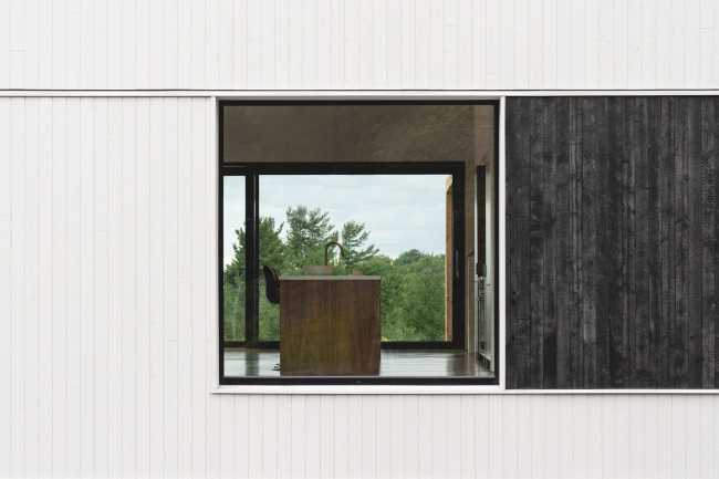 Una silhoutte presa in prestito dal vocabolario degli edifici rurali del New England: Saltbox Passive House